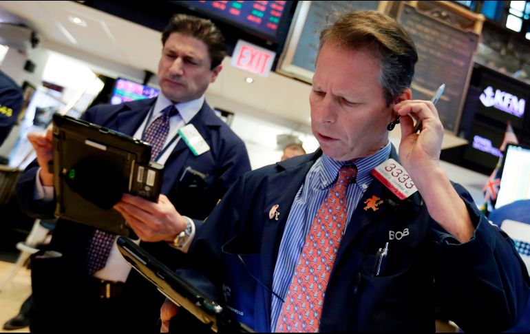 El Dow recortó 14.11 puntos, hasta 24 mil 448.83 unidades. AP / R. Drew