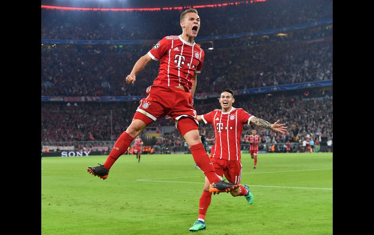 Joshua Kimmich (i), del Bayern, celebra tras anotar un gol en partido de semifinales de la Champions League ante Real Madrid, disputado en Munich, Alemania. Sin embargo, el equipo español acabó imponiéndose 2-1. AP/K. Joensson