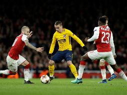 Griezmann peleó solo contra tres defensas del Arsenal para lograr el gol de la igualada. AP/M. Dunham