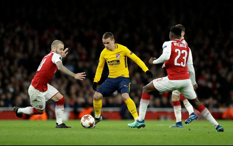 Griezmann peleó solo contra tres defensas del Arsenal para lograr el gol de la igualada. AP/M. Dunham
