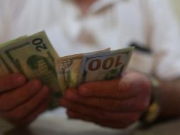 Para este día se prevé que el tipo de cambio cotice entre 18.60 y 18.80 pesos por dólar en cotizaciones interbancarias a la venta. EL INFORMADOR / ARCHIVO