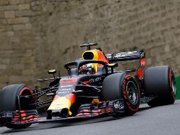 Ricciardo superó por un corto margen al finlandés Kimi Raikkonen, de Ferrari. AP/L. Bruno