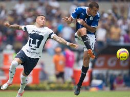 Acción del partido entre Pumas y Querétaro este domingo. MEXSPORT / J. Ramírez