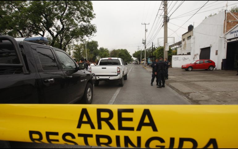 Además de investigar el homicidio, se analiza la sustancia que se encontró en dos vehículos, ubicados en el lugar de los hechos. EL INFORMADOR / ARCHIVO