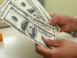 De acuerdo con Banco BASE, la depreciación de la moneda mexicana está relacionada con un fortalecimiento generalizado del dólar frente a sus principales cruces. EL INFORMADOR / ARCHIVO