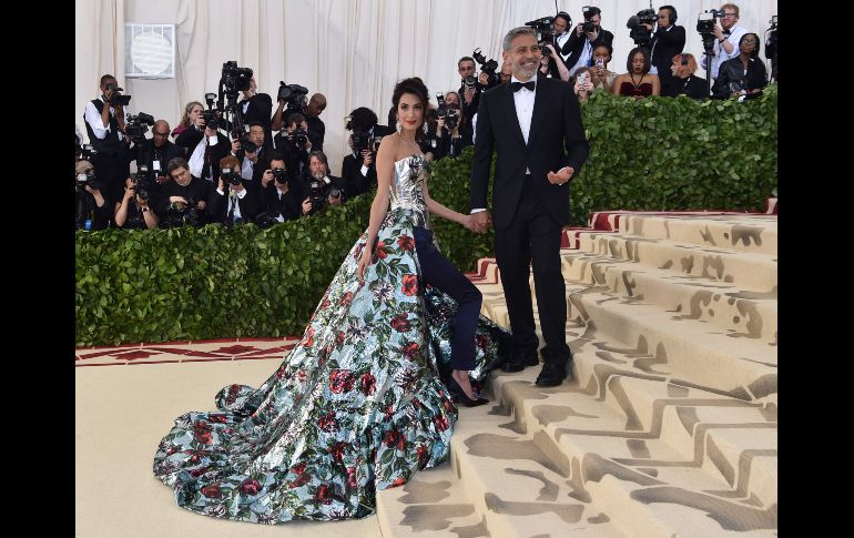 El actor George Clooney y su esposa Amal Clooney. AFP/H. Retamal