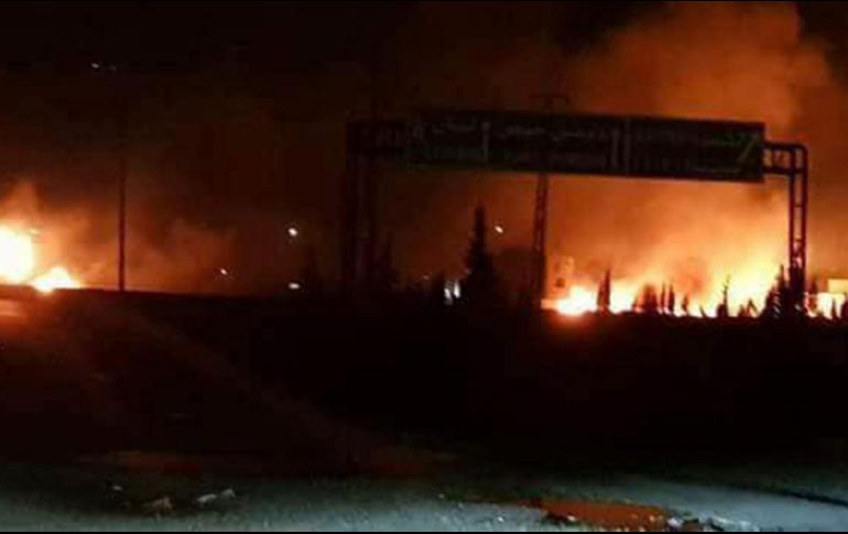 La televisión siria retransmitió imágenes en llamas en el sector de Kessna. AP / SANA