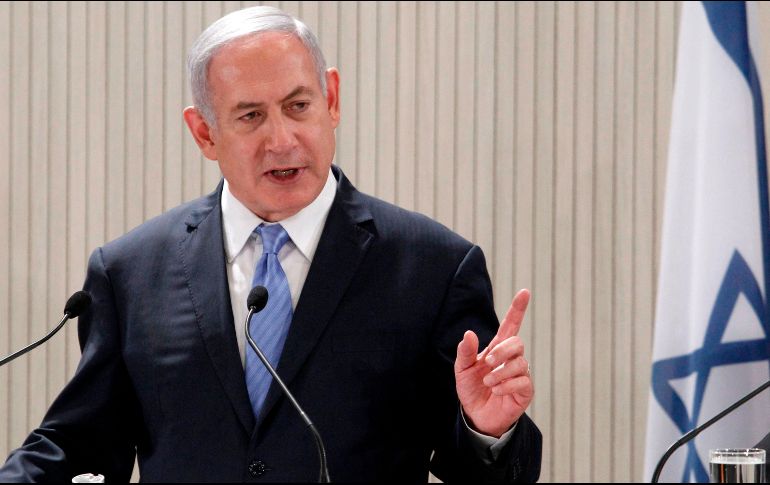 Netanyahu ofreció un discurso difundido por la televisión estatal israelí inmediatamente después del anuncio de Trump. AFP / Y. Kourtoglou