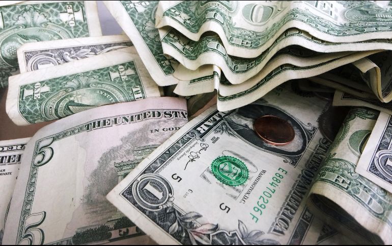 Especialistas prevén que primero podría darse el alza de tasas y después las subastas. AP/M. Lennihan