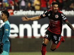 Martin Lucero forjó la victoria de Tijuana con anotaciones al minuto 27 y al 50. AFP/G. Arias