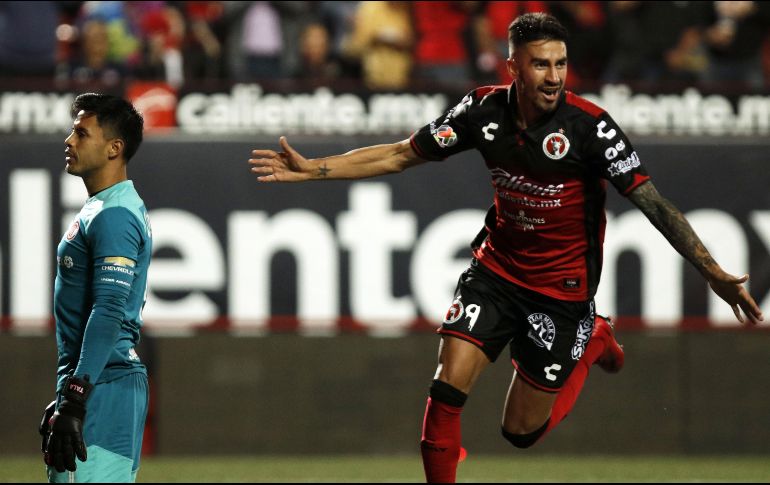 Martin Lucero forjó la victoria de Tijuana con anotaciones al minuto 27 y al 50. AFP/G. Arias