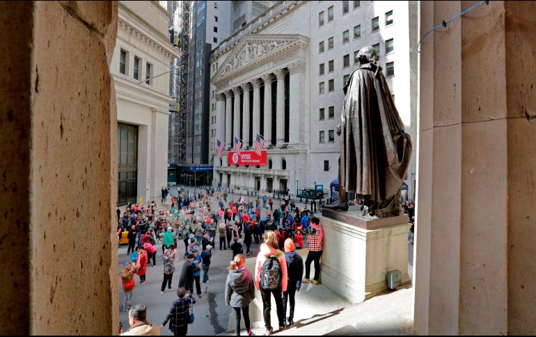 Durante los movimientos de apertura, el índice industrial Dow Jones gana 95.85 puntos (0.39 por ciento). AP / ARCHIVO