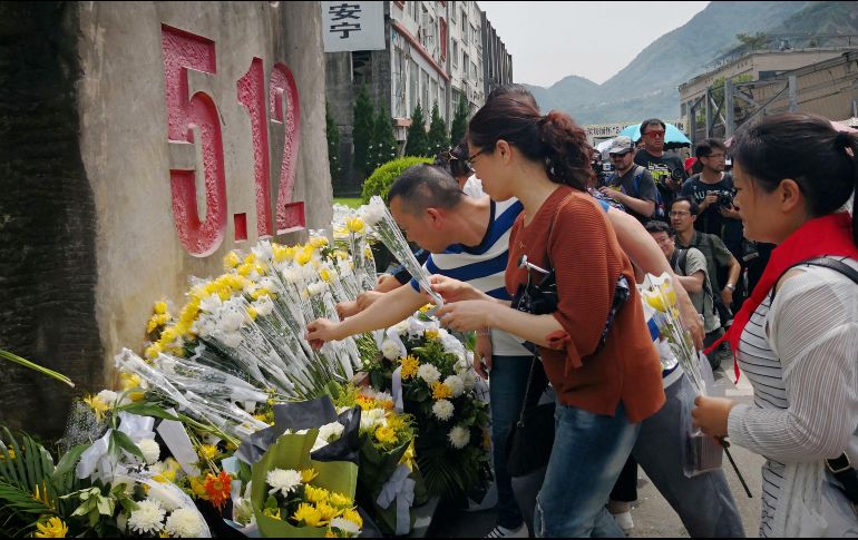 Muchos de los actos de conmemoración se celebraron en las ruinas de la ciudad de Beichuan. AFP
