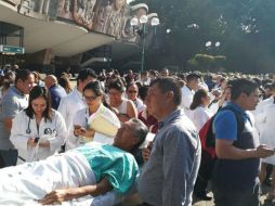 Fotogalería: Capitalinos desalojan inmuebles tras sismo