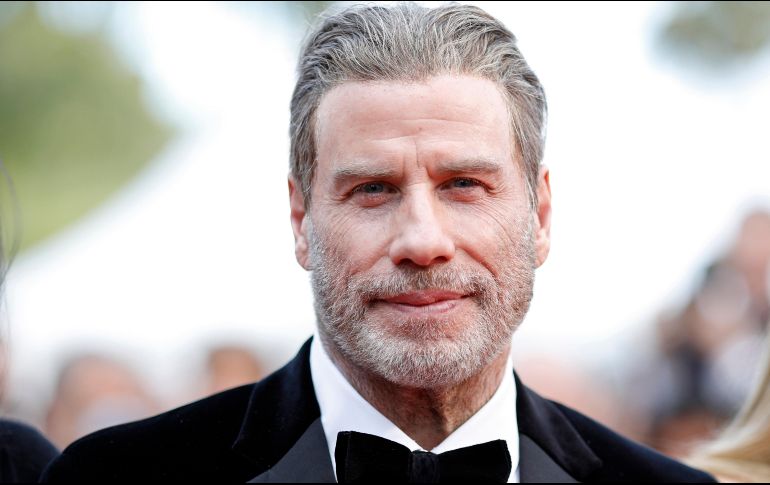 John Travolta regresó al Festival de Cine de Cannes para presentar su cinta sobre el mafioso John Gotti. EFE / F. Robichon