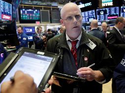 Las pérdidas de las compañías tecnológicas y los bancos lastraron las ganancias en otros sectores del mercado. AP / R. Drew