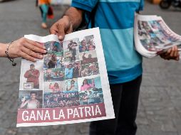 El primer boletín oficial divulgado por el Consejo Nacional Electoral (CNE) indicó que Maduro obtuvo cinco millones 823 mil 728 votos, frente a un millón 820 mil 552 votos de su más fuerte contendor, el candidato independiente Henri Falcón. AFP / L. Robayo