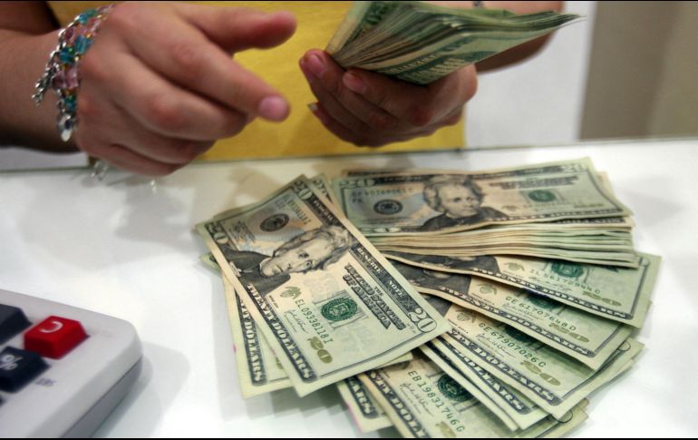 El Banxico fijó en 19.9934 pesos el tipo de cambio para solventar obligaciones denominadas en moneda extranjera pagaderas. EL INFORMADOR / ARCHIVO