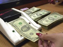 Durante 2017, el flujo total de remesas que se reportaron fue de 28 mil 771 millones de dólares. AP / ARCHIVO