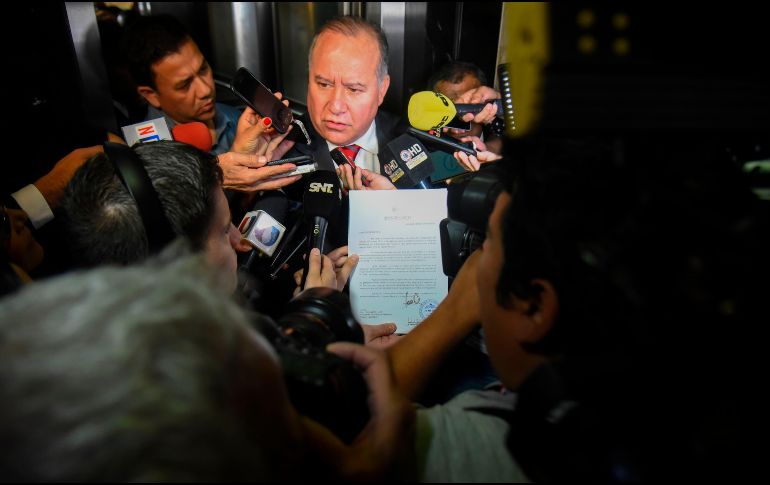 El Ministro, Darío Filártigaa, comparte una conferencia de prensa donde se explica la razón de que el mandatario haya dejado el cargo AFP / N. Duarte