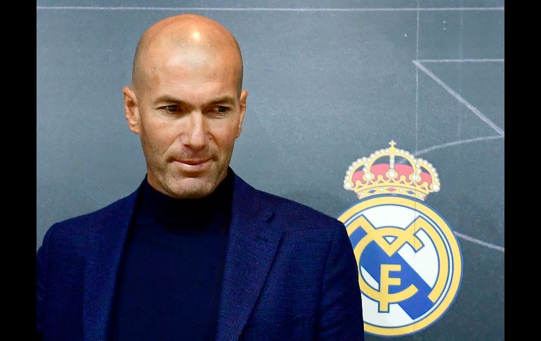 El francés Zinedine Zidane se ve tras anunciar en conferencia de prensa en Madrid, España, que deja de ser el técnico del Real Madrid. AFP/P. Marcou