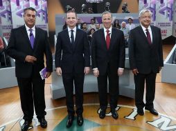 Las reglas que siguen vigentes son la prohibición a usar ipads y celulares; uso de carteles y materiales de apoyo; no hacer contacto físico con otros candidatos. AP / ARCHIVO