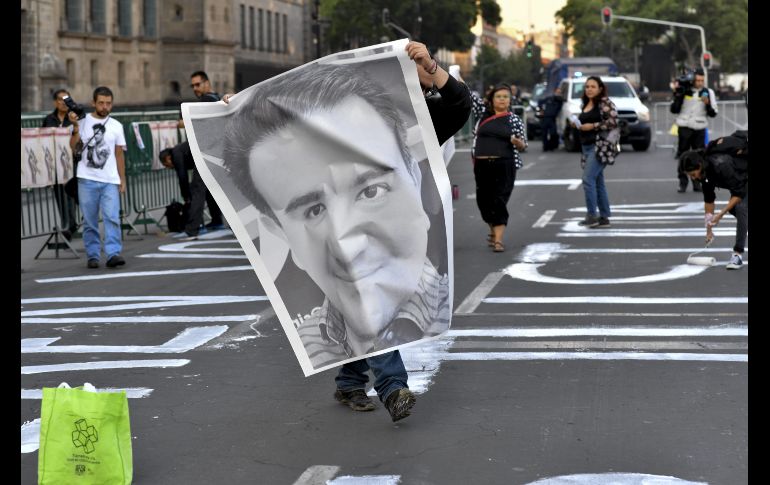 De acuerdo con la organización Artículo 19, durante el mandato del Presidente Enrique Peña Nieto, iniciado en diciembre de 2012, 42 periodistas han sido asesinatos. AFP/Y. Cortez