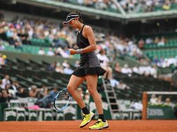 Con esta victoria, y debido a la eliminación de la danesa Caroline Wozniacki, Muguruza se acerca al número uno del mundo, que recuperará en caso de avanzar a la final del torneo Roland Garros. AFP / C. Archambault