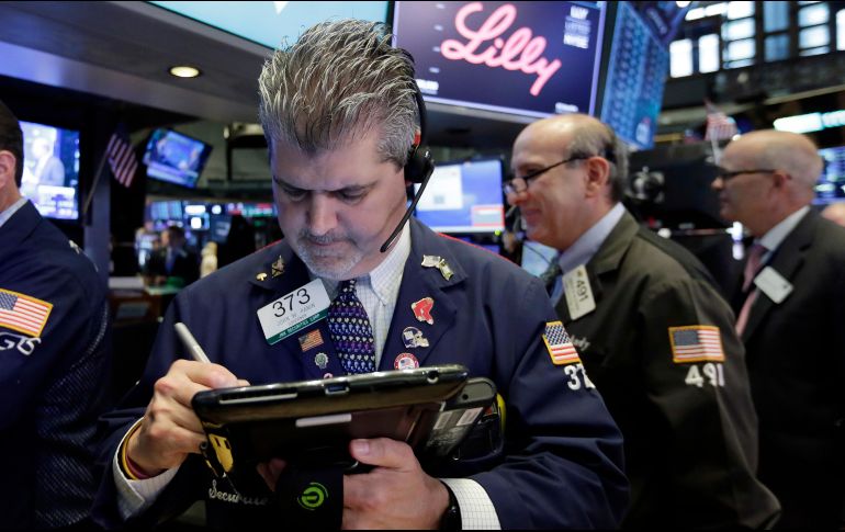 La jornada estuvo dominada por un aumento de valores financieros y un alza de las tasas de interés estadounidenses. AP / R. Drew