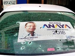 Los balazos impactaron en el portón principal, en vidrios y vehículos. EFE /