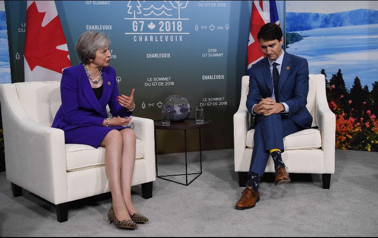 Los primeros ministros de Reino Unido y Canadá sostuvieron un encuentro durante 30 minutos. AFP / L. Neal