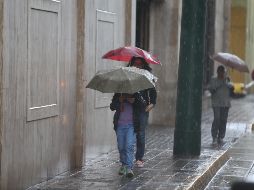 Este sábado, se pronostica cielo nublado la mayor parte del día con posibilidad de tormentas muy fuertes y actividad eléctrica en Jalisco, así como ambiente caluroso. EL INFORMADOR/ARCHIVO