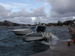 Piden a los responsables de embarcaciones que se encuentran fondeadas, asegurar su sistema de amarre o en su defecto retirarlas del agua a un área segura. EFE / ARCHIVO