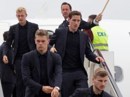 La Selección alemana lucía tranquila al llegar al aeropuerto de Vnúkovo. AP / A. Zemlianichenko