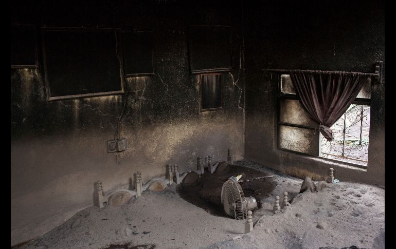 Un comedor sepultado en una casa de San Miguel Los Lotes,  a consecuencia de la erupción del Volcán de Fuego.