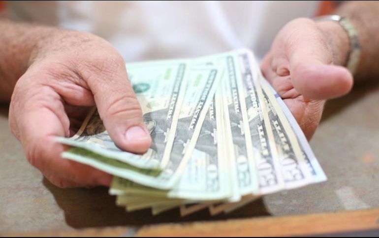 Banxico informa que el tipo de cambio para solventar operaciones denominadas en moneda extranjera pagaderas en el país se ubica en 20.6953 pesos. EL INFORMADOR / ARCHIVO