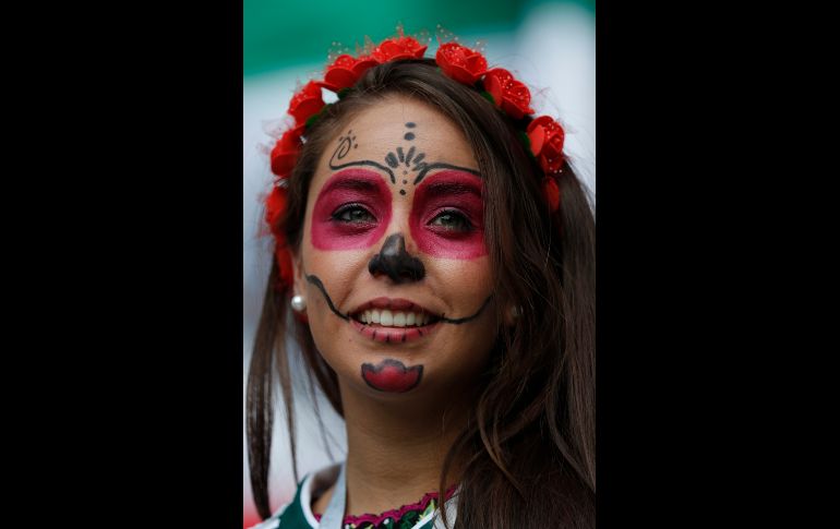 Los pintados de cara fueron una buena opción para quienes mostraron parte del folclor mexicano en Moscú. AP / E. Verdugo