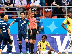 En el tercer minuto de partido, Carlos Sánchez vio la primera roja de la Copa del Mundo, en una jugada sancionada además con un penal que Shinji Kagawa transformó en gol. AFP / F. Monteforte