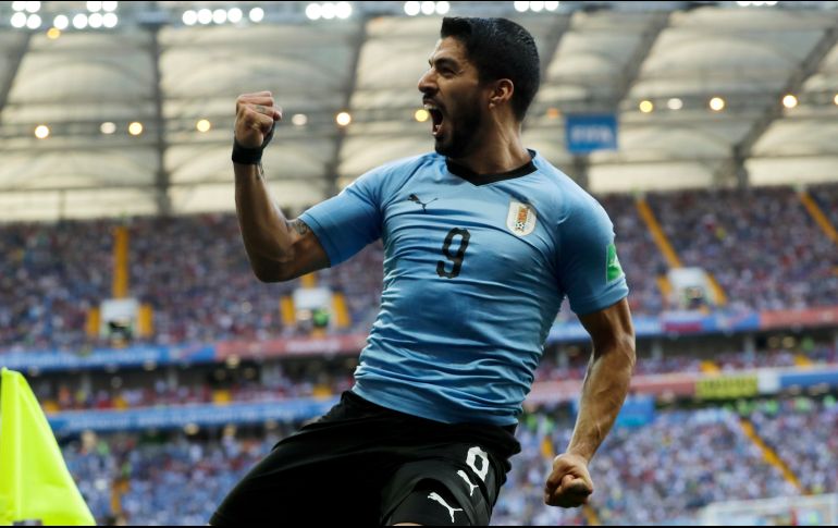 Sin sufrir, pero lejos de demostrar su potencial, los uruguayos son los primeros sudamericanos clasificados a la siguiente ronda. AP / A. Medichini