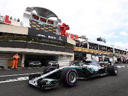 La lluvia, que había dado al traste prácticamente con la tercera sesión de libres, dos horas antes, no molestó en la clasificación, circunstancia que devolvía a Hamilton la condición de favorito. EFE / B. Horvat