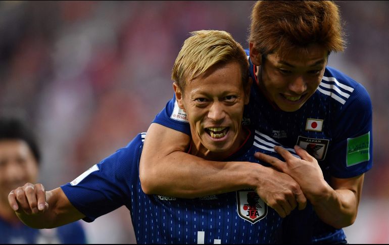 Keisuke Honda (I), del Pachuca, anotó el segundo tanto de los nipones. AFP/H. Retamal