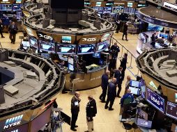 El NYSE Composite sube 4.85 puntos, operando con 12 mil 486.46 unidades. AP / ARCHIVO