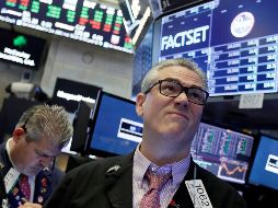 El mercado neoyorquino reportó ganancias pese a la incertidumbre de una guerra comercial con China. AP / R. Drew