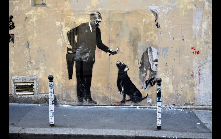 Un nuevo grafiti atribuido a Banksy se ve en el vecindario de la Sorbona. EFE/J. De la Rosa