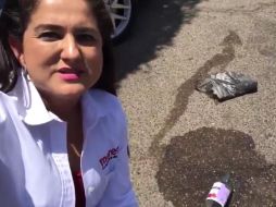 El artefacto explosivo que fue arrojado contra el auto de la candidata no detonó. FACEBOOK / @celidalopezc