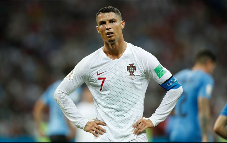 Siempre dependiente de la inspiración de Cristiano Ronaldo, Portugal no encontró en todo el primer tiempo los argumentos suficientes para incomodar a la implacable defensa charrúa. AFP / O. Andersen