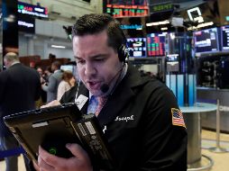 El índice compuesto del mercado Nasdaq, en el que cotizan importantes firmas tecnológicas, ganó un 0.76%. AP / R. Drew