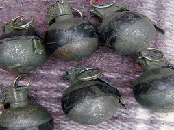 Además de los artefactos, policías aseguraron cinco fundas de tela verde y estuches color blanco. NTX