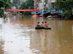 Las tormentas y lluvias torrenciales causan numerosas víctimas y graves destrozos todos los veranos en China. AFP/ARCHIVO