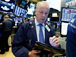 Los mercados siguen observando las tensiones comerciales, ya que el viernes entran en vigor los aranceles anunciados por Washington y Pekín en medio del pulso que mantienen. AP / R. Drew